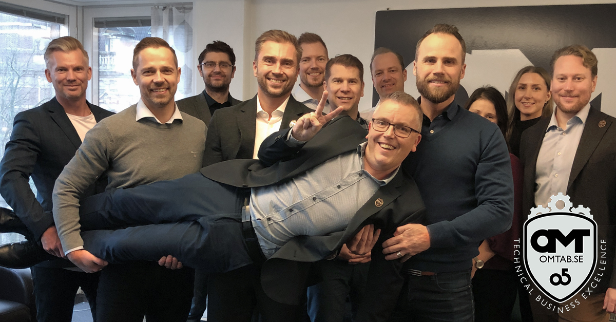 Group photo of happy co-workers.