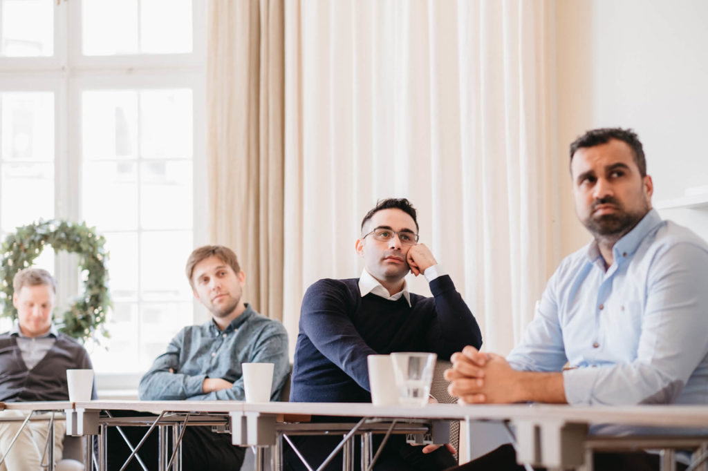 Persons sitting at tables