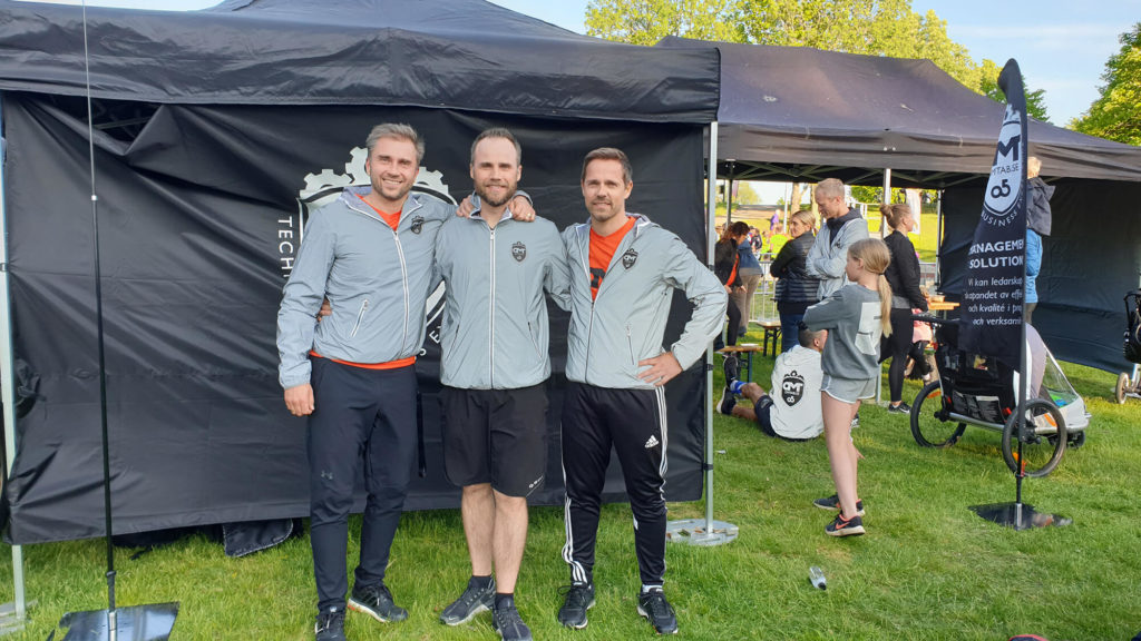 Three men in OMT-training clothes